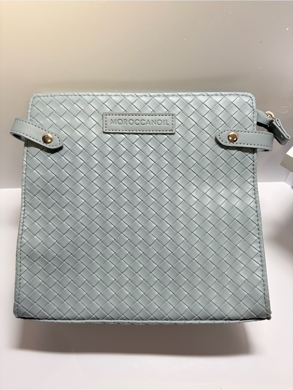 Moroccanoil woven cosmetic pouch